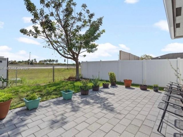 Дом в аренду по адресу 23501 SW 106 st - фото 7460620