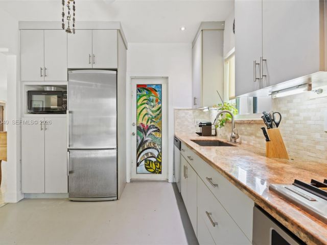 Продажа дома по адресу 8819 Hawthorne Ave - фото 7467027