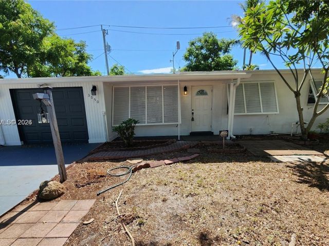 Продажа дома по адресу 3050 NE 13th Ave - фото 7478165