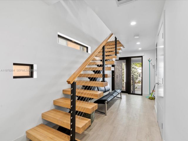 Дом в аренду по адресу 1134 71st St 1 - фото 7469009