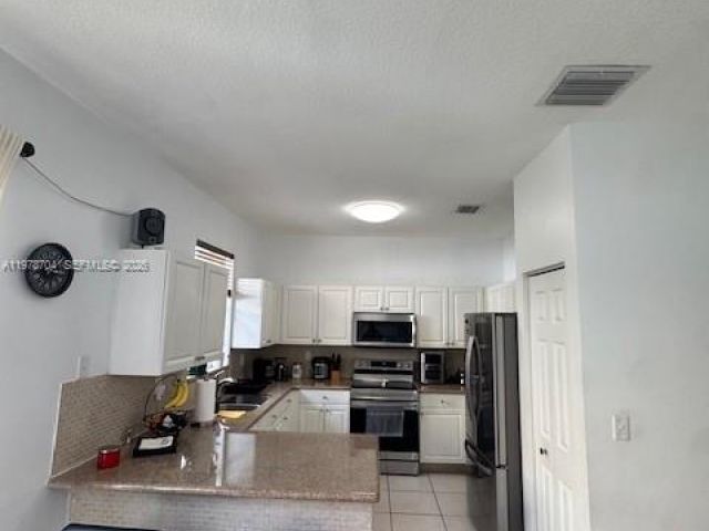 Продажа дома по адресу 12923 SW 135th Ter - фото 7515742