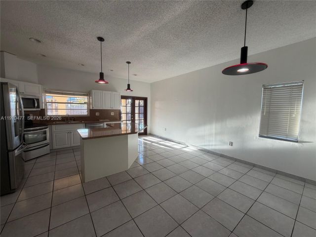 Продажа дома по адресу 1090 NW 128th Ct - фото 7530163