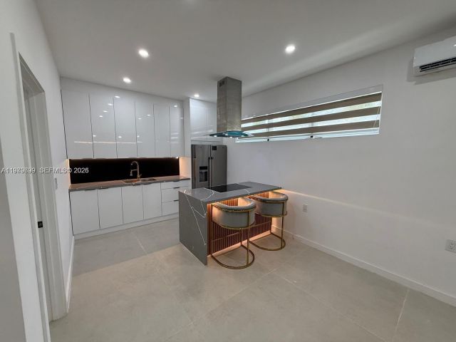 Дом в аренду по адресу 401 NW 131st St 401 - фото 7475543