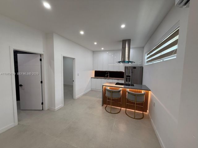 Дом в аренду по адресу 401 NW 131st St 401 - фото 7475544