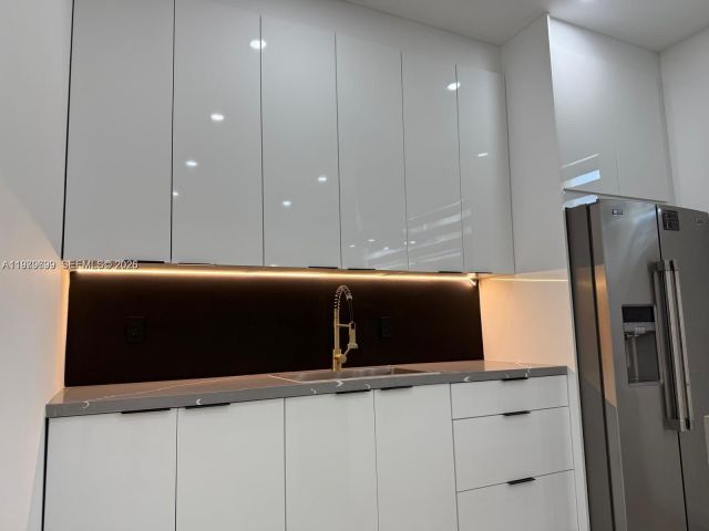 Дом в аренду по адресу 401 NW 131st St 401 - фото 7475550