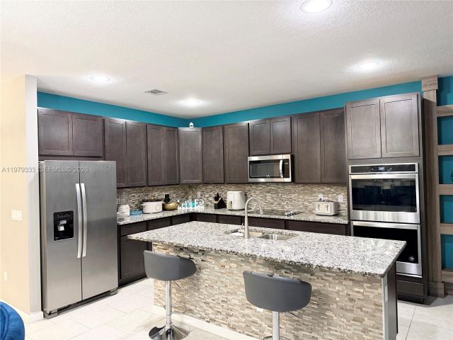 Дом в аренду по адресу 445 NW 36th Ave - фото 7478506