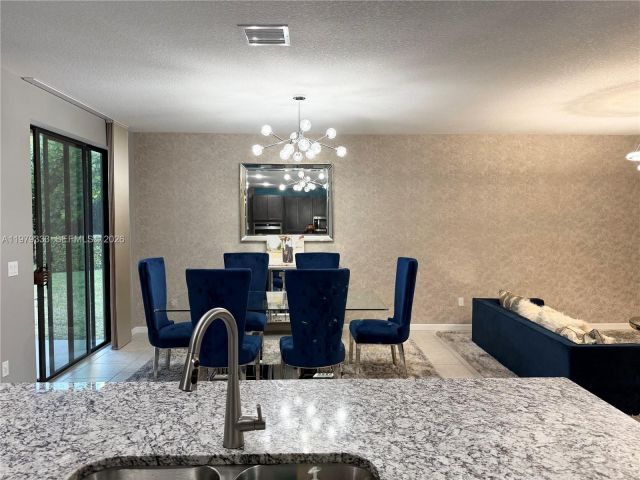 Дом в аренду по адресу 445 NW 36th Ave - фото 7478509