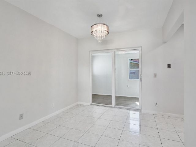 Дом в аренду по адресу 2621 SW Natura Ave - фото 7450537