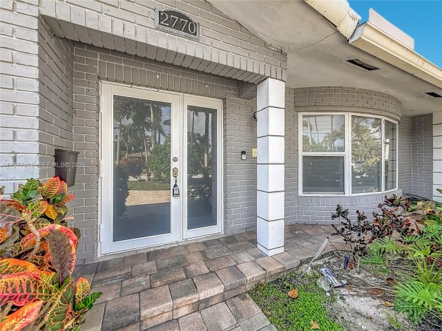 Дом в аренду по адресу 2770 NE 8th Ct - фото 7531109