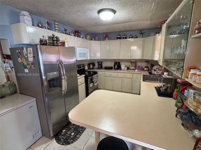 Продажа дома по адресу 3533 NW 2nd Ter - фото 7532676