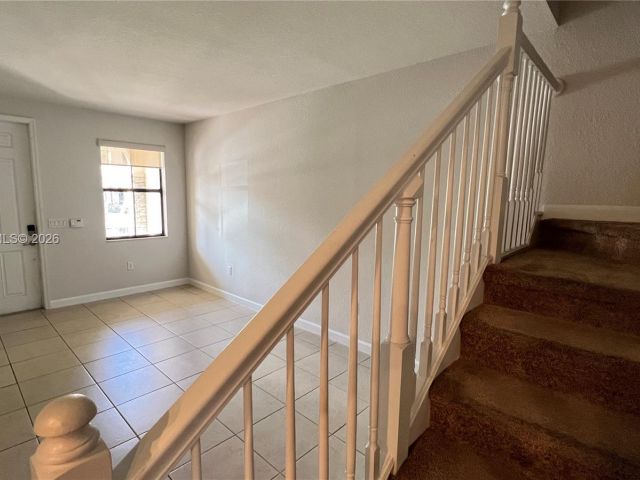 Дом в аренду по адресу 8899 NW 98 AV 8899 - фото 7485247