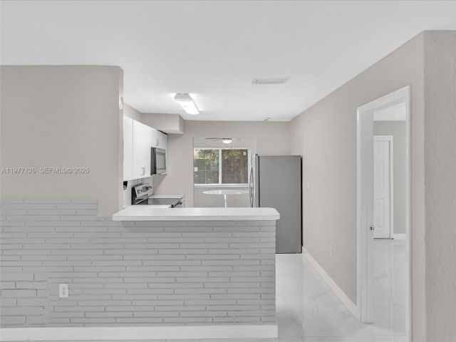 Дом в аренду по адресу 6800 Raleigh St - фото 7473115