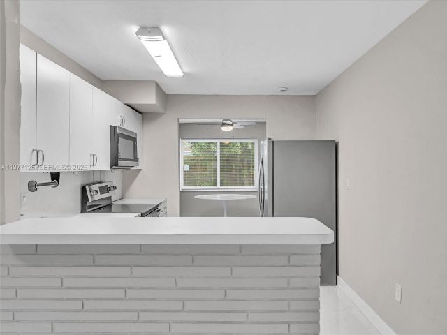 Дом в аренду по адресу 6800 Raleigh St - фото 7473116