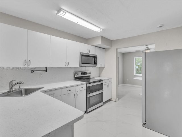 Дом в аренду по адресу 6800 Raleigh St - фото 7473118