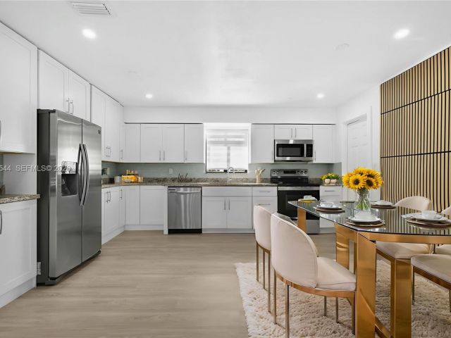 Дом в аренду по адресу 7501 Raleigh St - фото 7472737