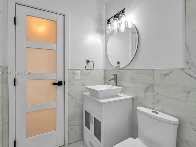 Дом в аренду по адресу 104 SW 7th St - фото 7462003