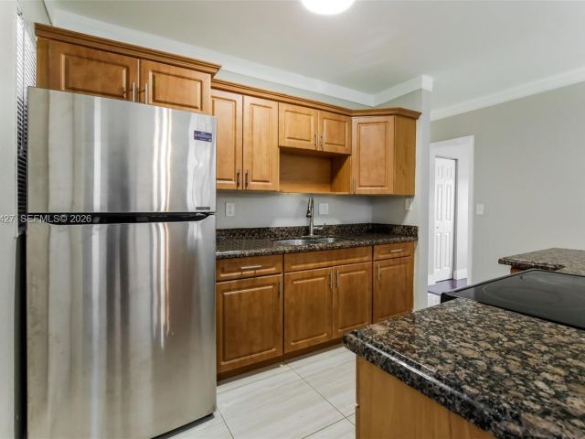 Дом в аренду по адресу 601 NW 194th St - фото 7479539