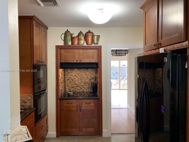 Дом в аренду по адресу 1511 SW 4th Ave A - фото 7481836