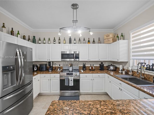 Продажа дома по адресу 12826 SW 134th St - фото 7465389