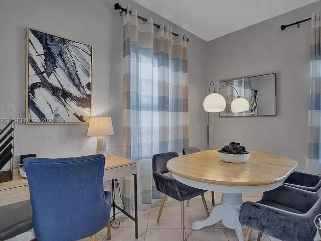 Продажа дома по адресу 8900 Harding Ave - фото 7466982