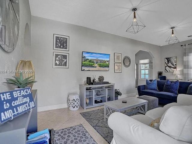 Продажа дома по адресу 8900 Harding Ave - фото 7466975