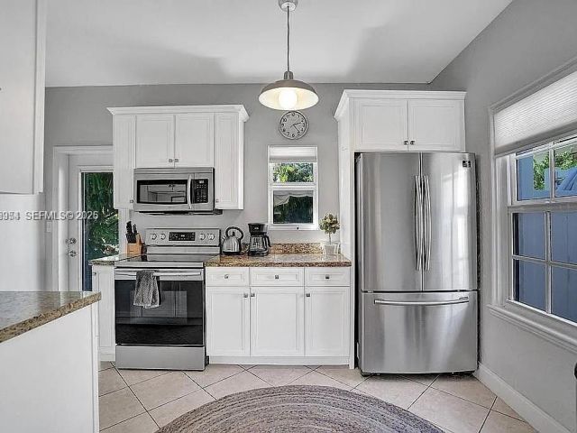 Продажа дома по адресу 8900 Harding Ave - фото 7466977