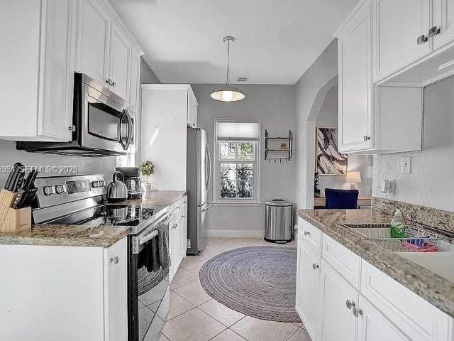 Продажа дома по адресу 8900 Harding Ave - фото 7466979