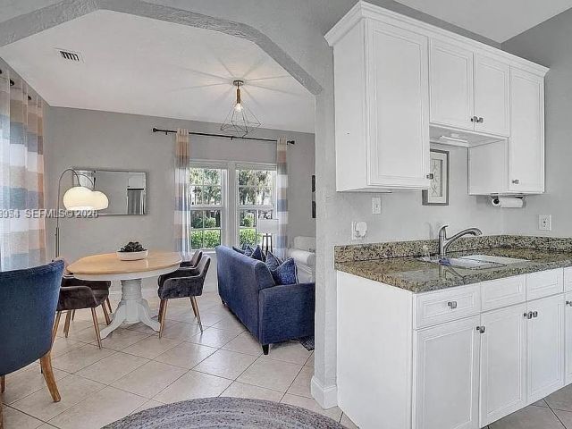 Продажа дома по адресу 8900 Harding Ave - фото 7466981