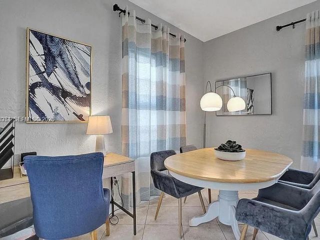 Продажа дома по адресу 8900 Harding Ave - фото 7466982