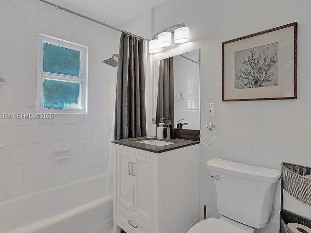 Продажа дома по адресу 8900 Harding Ave - фото 7466984