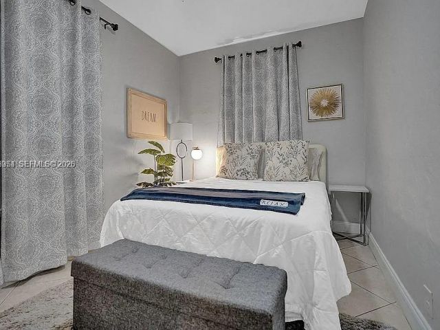 Продажа дома по адресу 8900 Harding Ave - фото 7466987