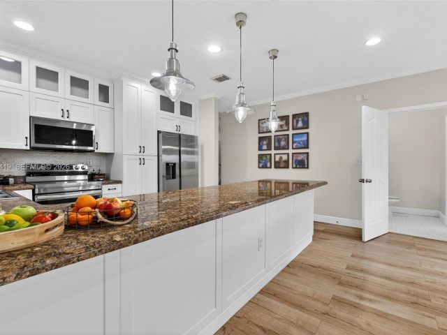 Дом в аренду по адресу 15874 SW 138th Ter 2 - фото 7501664