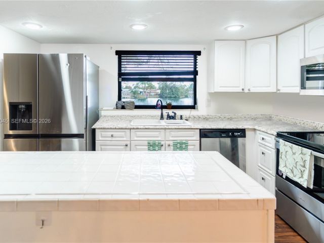 Дом в аренду по адресу 8980 Palm Tree Ln 8980 - фото 7518423