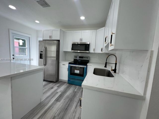 Продажа дома по адресу 743 NW 77th Ter - фото 7536950