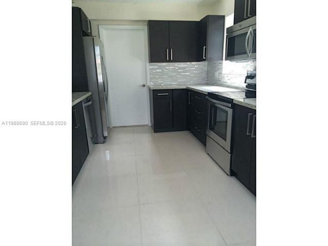 Дом в аренду по адресу 740 NE 179 TE - фото 7525941