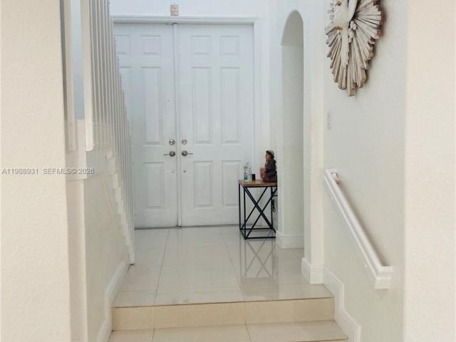 Дом в аренду по адресу 10963 NW 87th Ln 10963 - фото 7526240