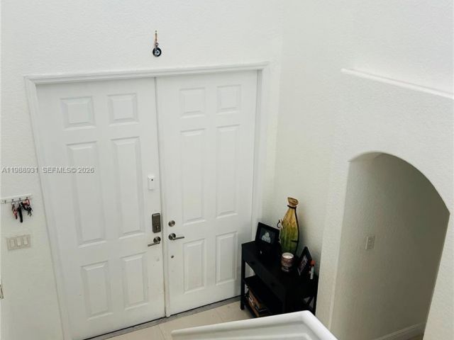 Дом в аренду по адресу 10963 NW 87th Ln 10963 - фото 7526241