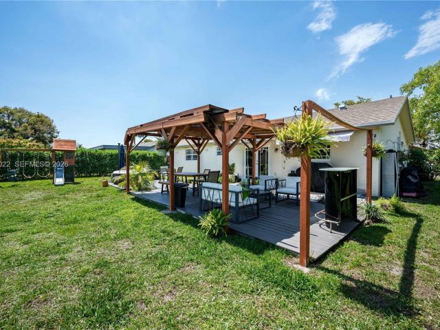 Продажа дома по адресу 401 NW 83rd Way - фото 7536406