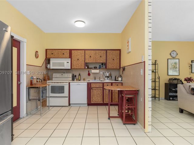 Продажа дома по адресу 906 NE 5th St - фото 8628665