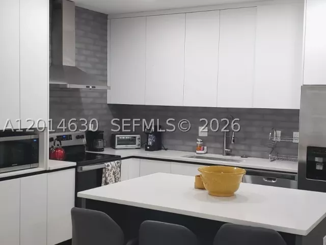 Продажа дома по адресу 613 NW 10th St - фото 9173906