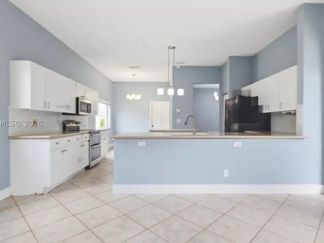 Продажа дома по адресу 1101 NW 180th Ave - фото 9308924