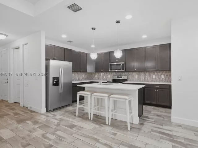 Продажа дома по адресу 3384 NW 5th St - фото 8894004