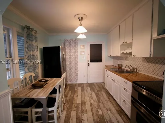 Продажа дома по адресу 100 NE 5th St - фото 8913074