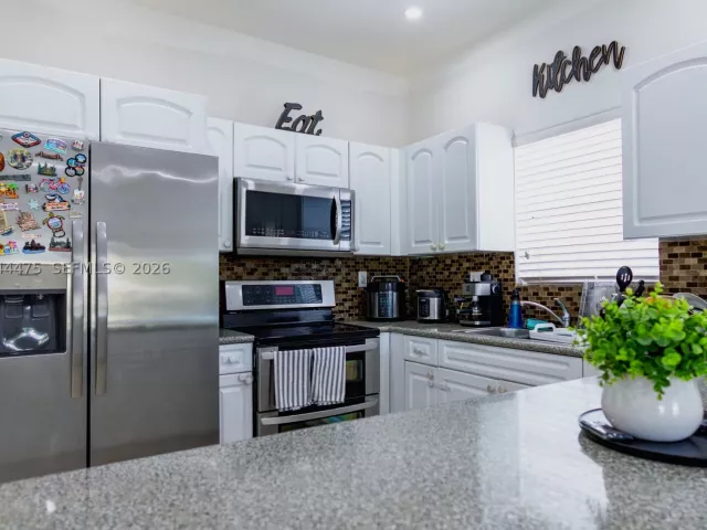 Продажа дома по адресу 6939 SW 158th Ave - фото 8925531