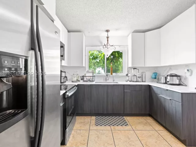 Продажа дома по адресу 8014 SW 133rd Ct - фото 8888522
