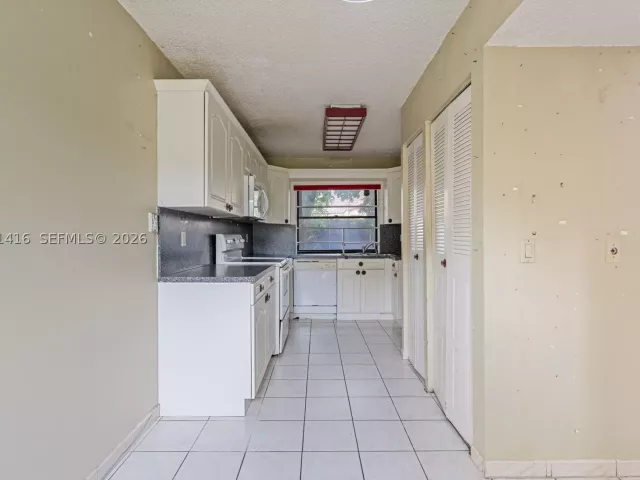 Продажа дома по адресу 6233 NW 170th Ter - фото 8869685
