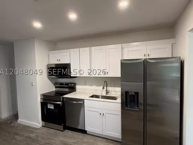 Продажа дома по адресу 2530 NW 14th Ct - фото 8920903