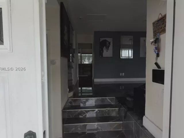 Продажа дома по адресу 7400 NW 1st Ct - фото 8898396