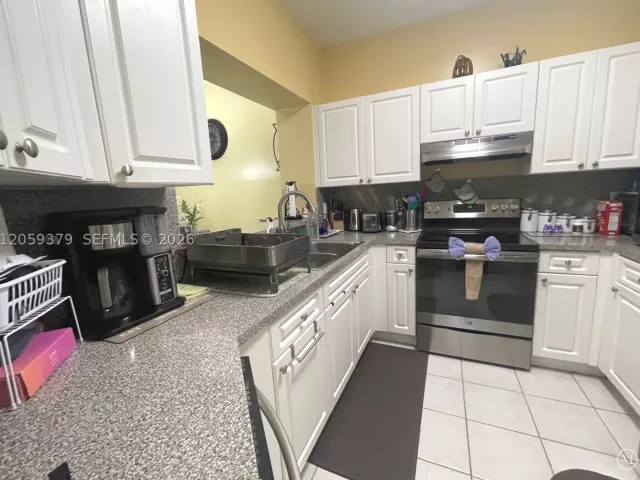 Продажа дома по адресу 904 NW 100th Ave - фото 9356393