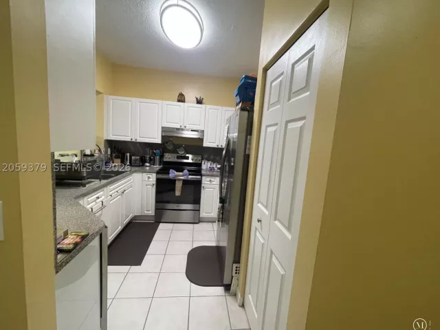 Продажа дома по адресу 904 NW 100th Ave - фото 9356395